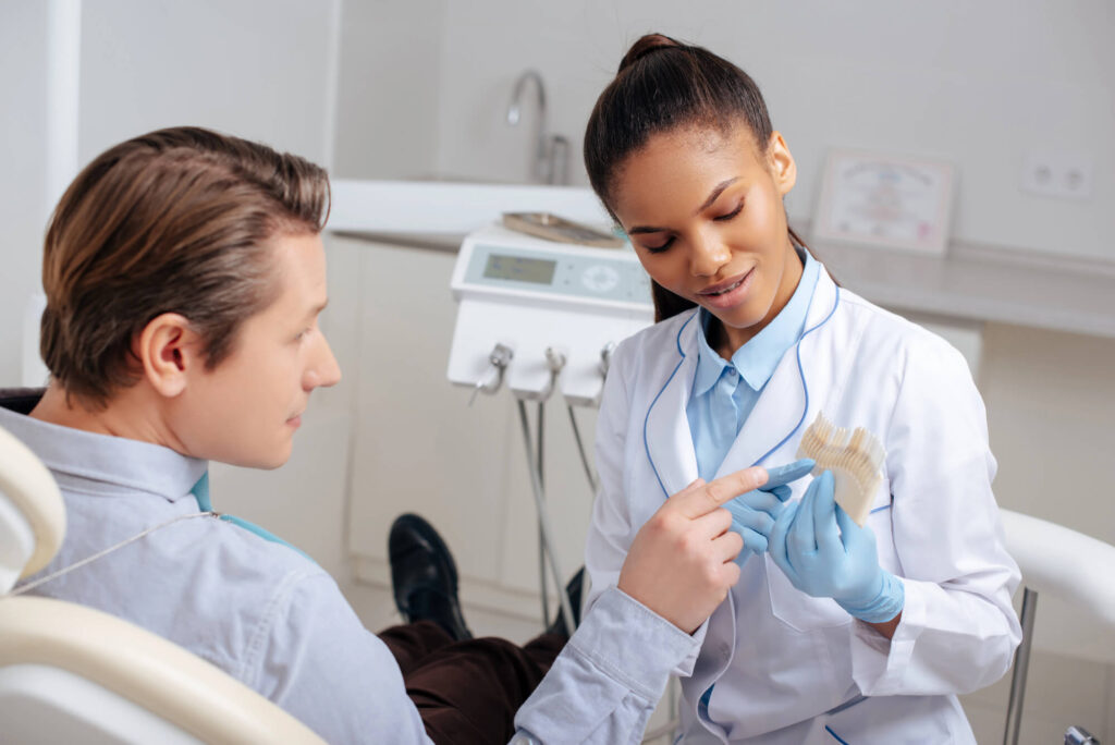 cosmetic dentist Moody AL talking to patient