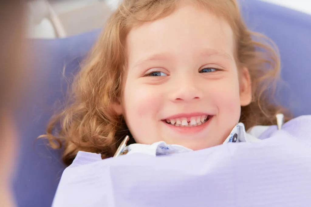 girl visits pediatric dentist moody al