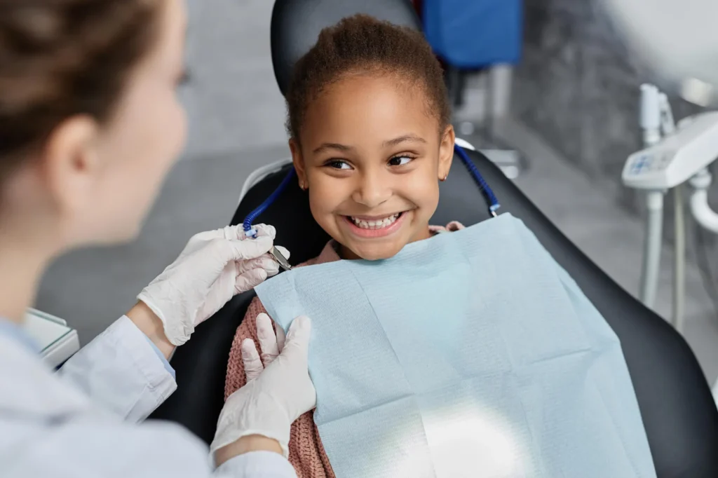 pediatric dentist moody al talking to patient