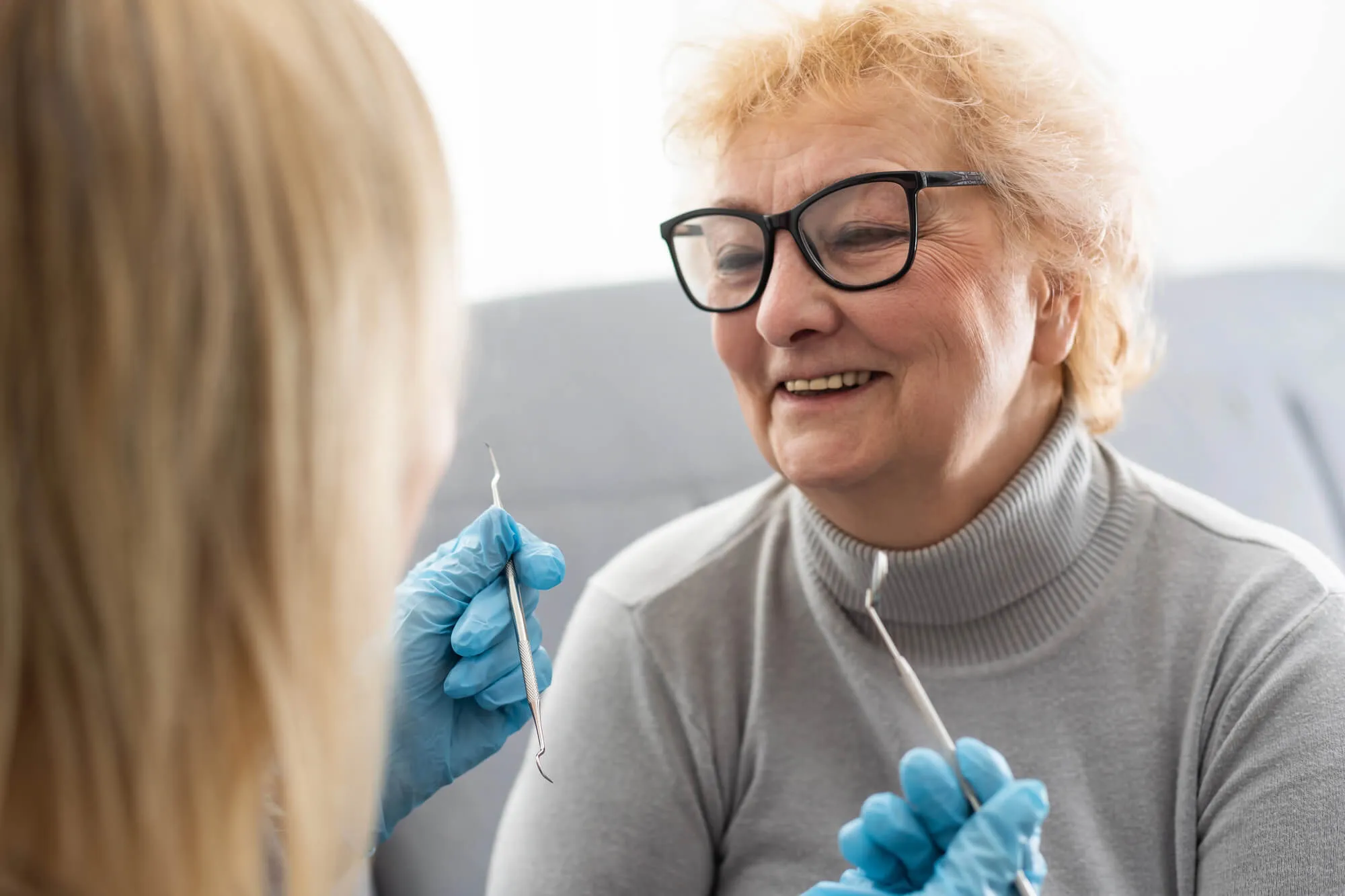 dentist in st. clair county talking to patient